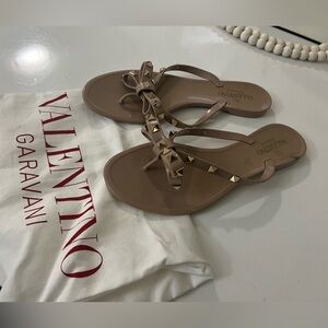 One of the sandals has a stain.